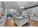 Spacious kitchen featuring modern appliances, granite counters, and hardwood floors perfect for cooking at 4286 Pacifico Ln, Las Vegas, NV 89135