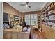 Bright office with built in bookshelves, plenty of natural light, and decorations at 4286 Pacifico Ln, Las Vegas, NV 89135