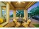 Outdoor patio area, perfect for relaxation and entertaining, with lush greenery and backyard views at 4286 Pacifico Ln, Las Vegas, NV 89135