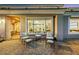 Covered patio with cozy seating offering views of the elegant interiors at 4286 Pacifico Ln, Las Vegas, NV 89135