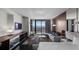 Modern bedroom with a sitting area featuring city views and modern decor at 4381 W Flamingo Rd # 3809, Las Vegas, NV 89103
