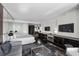Sleek bedroom boasts dark wood floors, modern decor, and a comfortable sitting area at 4381 W Flamingo Rd # 3809, Las Vegas, NV 89103