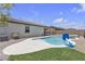 Backyard features a swimming pool with a basketball hoop and grass with patio at 4544 Velvet Oak Ct, Las Vegas, NV 89115