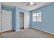 Bedroom with carpet, window, ceiling fan, and closet at 4544 Velvet Oak Ct, Las Vegas, NV 89115