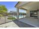 Back patio featuring pool, spa, safety fence, and covered patio at 4544 Velvet Oak Ct, Las Vegas, NV 89115