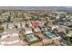 An aerial view of a home that features a covered patio, swimming pool and luscious landscaping in the backyard at 4562 Sparwood Dr, Las Vegas, NV 89147