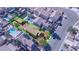 An aerial view of a home that features a spacious backyard with outdoor kitchen and swimming pool at 4562 Sparwood Dr, Las Vegas, NV 89147