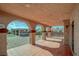 This backyard offers a covered patio and a large brick paved area at 4562 Sparwood Dr, Las Vegas, NV 89147