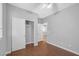 Comfortable bedroom with wood floors and a closet, providing a peaceful retreat with ample storage space at 4562 Sparwood Dr, Las Vegas, NV 89147