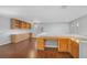 Bright bonus room with beautiful hardwood floors, cabinets and desk at 4562 Sparwood Dr, Las Vegas, NV 89147