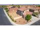 Aerial view of home showing desert landscaping and tile roof at 512 Los Dolces St, Las Vegas, NV 89138