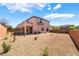 Spacious backyard with minimal landscaping and privacy fence at 512 Los Dolces St, Las Vegas, NV 89138