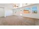 Spacious bedroom with neutral carpet, large windows, and natural light at 512 Los Dolces St, Las Vegas, NV 89138