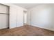 Minimalist bedroom with carpet, closet, and door to hall at 512 Los Dolces St, Las Vegas, NV 89138