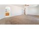 Expansive bedroom with carpet flooring, and access to a bathroom at 512 Los Dolces St, Las Vegas, NV 89138