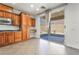 Well-designed kitchen features granite counters, modern appliances, and backyard access at 512 Los Dolces St, Las Vegas, NV 89138