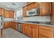 Well-equipped kitchen features modern appliances, granite countertops, and ample cabinet space at 512 Los Dolces St, Las Vegas, NV 89138