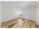 Bedroom with wood-look flooring, ceiling fan, and a closet at 5232 Saranac Rd, Las Vegas, NV 89130