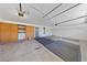Spacious garage featuring ample storage cabinets and neutral paint at 5232 Saranac Rd, Las Vegas, NV 89130