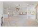 Open-concept living area featuring a fireplace and seamless transition to the entryway and kitchen at 5232 Saranac Rd, Las Vegas, NV 89130