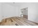 Bright living room showcasing wood-style floors and neutral paint at 5232 Saranac Rd, Las Vegas, NV 89130