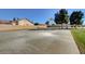 Outdoor basketball court in a community park with lush green trees and blue skies at 5236 Krista Alethea St, North Las Vegas, NV 89031