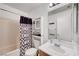 Bright bathroom featuring a shower-tub combo, vanity, and ample storage space at 5236 Krista Alethea St, North Las Vegas, NV 89031