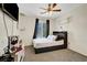 Well-lit bedroom offering neutral carpeting and a window, ideal for relaxation at 5236 Krista Alethea St, North Las Vegas, NV 89031