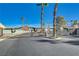 Gated community entrance with decorative wreaths and well-maintained landscaping at 5236 Krista Alethea St, North Las Vegas, NV 89031