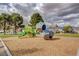' playground featuring a climbing structure, slide, and play equipment on a wood chip surface at 5236 Krista Alethea St, North Las Vegas, NV 89031