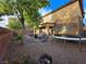Backyard featuring a grill, trampoline, patio furniture, and rock landscaping at 5507 Gemini Bridges St, Las Vegas, NV 89130