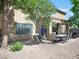 A large backyard featuring a patio with grill and dining set at 5507 Gemini Bridges St, Las Vegas, NV 89130