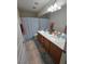 Bright bathroom showcasing double sinks with nice countertop at 5507 Gemini Bridges St, Las Vegas, NV 89130