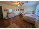 Bright bedroom featuring hardwood floors, nice light, and neutral wall color at 5507 Gemini Bridges St, Las Vegas, NV 89130