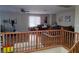 Spacious bonus room with wood railing, neutral walls, and plenty of natural light at 5507 Gemini Bridges St, Las Vegas, NV 89130