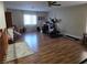 Versatile bonus room with wood floors, workout equipment, and ample space at 5507 Gemini Bridges St, Las Vegas, NV 89130