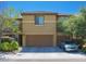Charming two-story townhouse with well-maintained landscaping and a two-car garage at 5507 Gemini Bridges St, Las Vegas, NV 89130