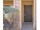 Inviting entryway features a secure iron gate and a charming, welcoming aesthetic at 5507 Gemini Bridges St, Las Vegas, NV 89130