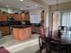 Modern kitchen featuring stainless appliances, granite countertops, and access to dining area at 5507 Gemini Bridges St, Las Vegas, NV 89130