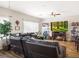 Inviting living room with a fireplace and large screen, creating a cozy and modern atmosphere at 5507 Gemini Bridges St, Las Vegas, NV 89130