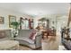 Cozy living room with hardwood floors and elegant furniture, perfect for relaxing and entertaining at 5507 Gemini Bridges St, Las Vegas, NV 89130