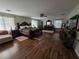 Spacious main bedroom with wood floors, sitting area, and plenty of natural light at 5507 Gemini Bridges St, Las Vegas, NV 89130