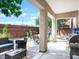 An outdoor patio with seating area, built in grill, and shade at 5507 Gemini Bridges St, Las Vegas, NV 89130