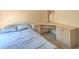 Bedroom with desk, natural light, and standard carpet at 5713 Whiteridge Ave, Las Vegas, NV 89107