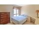 Cozy bedroom featuring natural light, standard closet, and standard dresser at 5713 Whiteridge Ave, Las Vegas, NV 89107