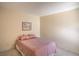 Bedroom with queen bed, standard closet, and carpet at 5713 Whiteridge Ave, Las Vegas, NV 89107
