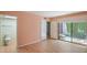 Bright bedroom with ensuite bathroom and sliding doors to the outdoor patio at 5713 Whiteridge Ave, Las Vegas, NV 89107