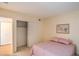 Bedroom with queen bed, standard closet, and carpet at 5713 Whiteridge Ave, Las Vegas, NV 89107