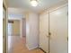 Neutral entryway with a large front door and wood flooring at 5713 Whiteridge Ave, Las Vegas, NV 89107