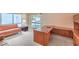 Comfortable living room features plush carpeting and a large window at 5713 Whiteridge Ave, Las Vegas, NV 89107
